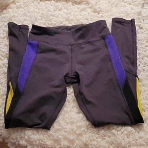 Nikibiki - size small leggings - dark gray w/ purple & yellow accents